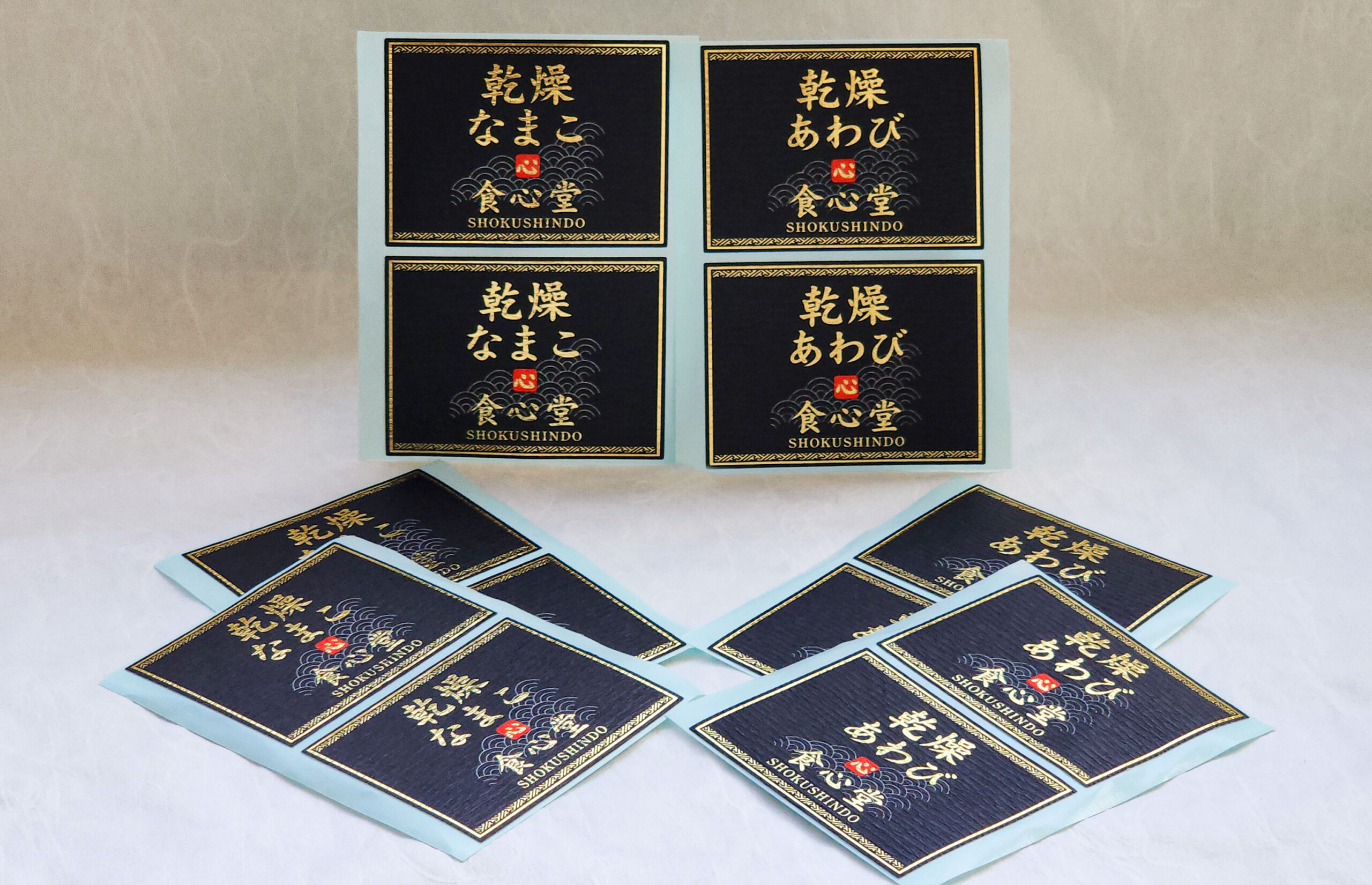 耐水和紙と金箔で高級感と実用性も兼ね備えた水産加工食品ラベル